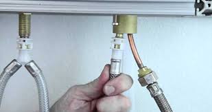 how to disconnect sprayer hose from delta faucet
