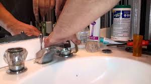 how to remove a stuck faucet handle